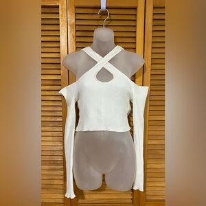 White, long-sleeved crop top by Urban Outfitters